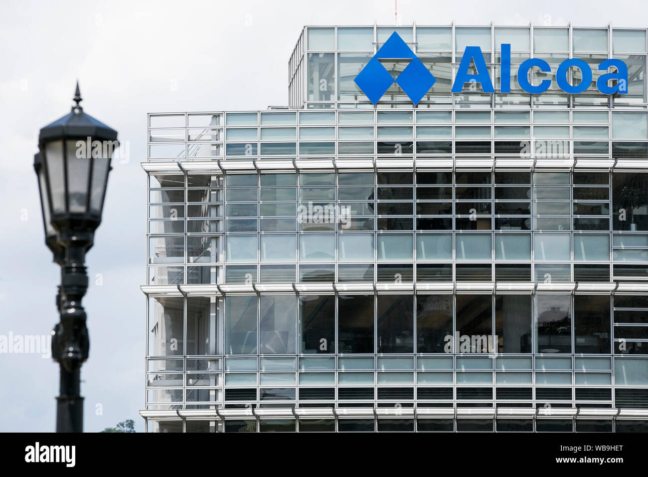 A logo sign outside of the headquarters of the Alcoa Corporation ...